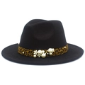 Detailed close-up of a black wool fedora featuring leopard ribbon and pearl embellishments - Black