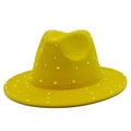 Macro detail of yellow fedora hat with sparkling rhinestones on wool felt material - Yellow