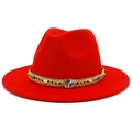 Close-up of red wool fedora hat with gold braided band and blue crystal accents - Red