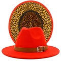 Detail of red fedora hat featuring leopard print lining and brown leather belt trim - Red