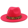 Detailed view of rose pink fedora hat featuring a snakeskin pattern leather band and gold stud - Rose Red