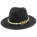 Detail of black straw fedora hat featuring yellow woven band and gold chain links - Black