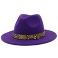 Detail of purple fedora hat featuring a snakeskin leather band and gold stud accent - Purple