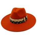 Detail of caramel fedora with gold band, white pearls and sparkling rhinestone accents - Dark Orange