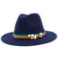 Detail of navy wool fedora hat featuring rainbow ribbon with pearls and flower accents - Dark Blue