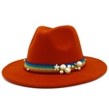 Detailed view of caramel wool fedora with colorful glitter ribbon and pearl accents - Dark Orange