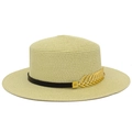Detail of flat top straw hat with black band and gold feather buckle accessory - Beige
