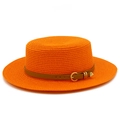 Detail of orange woven straw boater hat with brown leather belt and gold heart buckle - Orange