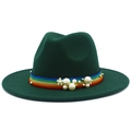 Close-up of dark green fedora featuring rainbow woven band with pearls and floral accent - Dark Green