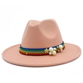 Detail of pink wool fedora featuring colorful ribbon, white pearls, and golden flower - Flesh Pink