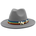 Detail view of grey wool fedora hat with rainbow ribbon and pearl floral accents - Gray