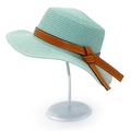 Detail of mint green woven straw hat with brown leather band and knot decoration - One Size / Mint Green