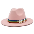 Detail of pink wool fedora hat featuring rainbow striped band with pearls and floral accents - Pink