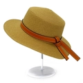 Detail of flat-top straw sun hat featuring a classic orange-brown leather decorative strap - One Size / Brown