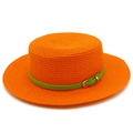 Detail of orange straw hat featuring a woven texture and green belt with gold buckle - Orange