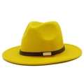 Close-up of a yellow wool felt fedora hat featuring a black leather band and gold buckle - Yellow