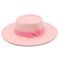 Detailansicht eines rosa Wollfilzhutes mit Ripsband und Schleifenverzierung - Rosa