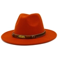 Detail of orange fedora wool hat featuring a brown braided band and golden feather charm - Dark Orange