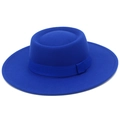 Detailed close-up of vibrant royal blue wool felt hat with decorative ribbon band - Sapphire Blue