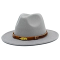 Detail of grey wool fedora hat featuring ethnic embroidery and golden feather charm - Gray