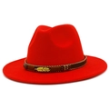 Detail of red wool fedora featuring a decorative band with gold feather and beads - Red