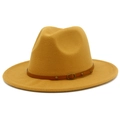 Detail of mustard yellow wide brim fedora with brown leather band and metal rivets - Khaki