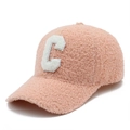 Detail view of pink sherpa fleece baseball cap with white letter C towel embroidery - Pink