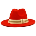 Detail of red wool felt fedora featuring a striped beige and brown decorative hat band - Red