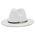 Detailed macro view of white felt fedora hat with gold rhinestone buckle and black band decoration - White