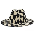 Close-up of distorted black and white checkerboard pattern on felt fedora hat - One Size / Beige