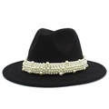 Detail of elegant black fedora hat showing layered faux pearls on the decorative band - One Size / Black