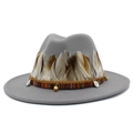Detail of grey fedora hat with feather trim, woven belt, and tribal bead accents - Gray