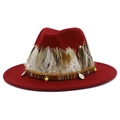 Detail of burgundy wool fedora hat featuring ethnic feathers, beads and silver coin charms - Burgundy