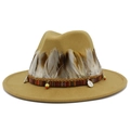 Detail of camel wool fedora hat featuring ethnic beads and feather decorative trim - Camel