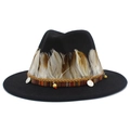 Detail of black fedora hat with feather band, leather strap, and ethnic coin charms - Black