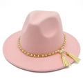 Detail of pink fedora hat featuring gold chain link with white pearls and beige tassels - Pink