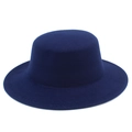 Detailed view of a dark blue flat top wool felt hat with a smooth texture and wide brim - Dark Blue