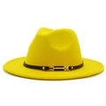 Detail of a bright yellow fedora hat featuring a black band with a gold metal buckle - Yellow