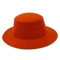 Close-up of vibrant orange wool felt boater hat featuring clean stitching and wide flat brim - Dark Orange
