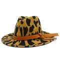 Detail shot of the cow print felt fedora with a stylish brown leather band decoration - One Size / Khaki Leopard