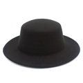 Side view of a minimalist black flat-top wool felt hat with a wide straight brim - Black