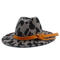 Detail of grey felt fedora hat featuring black cow print and brown leather decorative band - One Size / Grey Cow Print