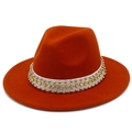 Detail of orange wool fedora featuring a white band with yellow rhinestones and silver studs - Dark Orange