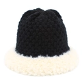 Detail of black knit texture and soft white faux fur trim on winter bucket hat - Black