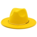 Detail of a bright yellow wool fedora hat with a black band and gold buckle - Yellow