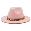 Detailed shot of pink fedora hat featuring ethnic beads and colorful stone buckle - Pink