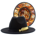 Close-up of black wool fedora with gold feather pin and orange tiger print lining - One Size / Black Outer Dynamic Tiger Lining