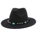 Detail of black fedora hat with turquoise stones and silver studs on a leather band - Black
