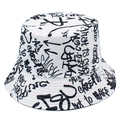 Detail of white bucket hat featuring black graffiti letters and stitched brim design - White