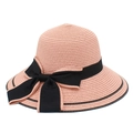 Detail of peach pink straw hat featuring fine weave texture and elegant black bow ribbon - One Size / Pink